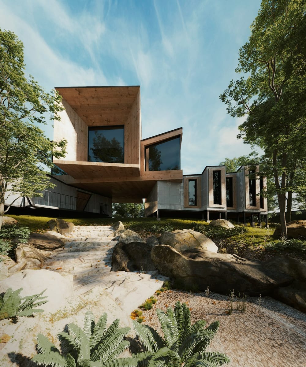 A concrete house on a wooded hillside